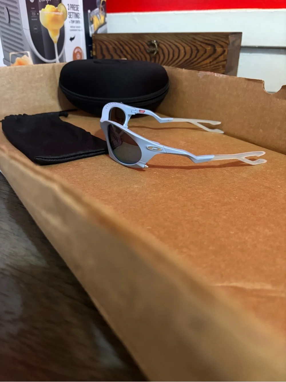 Oakley Light Blue PLANTARIS Sunglasses with Mirrored Lenses